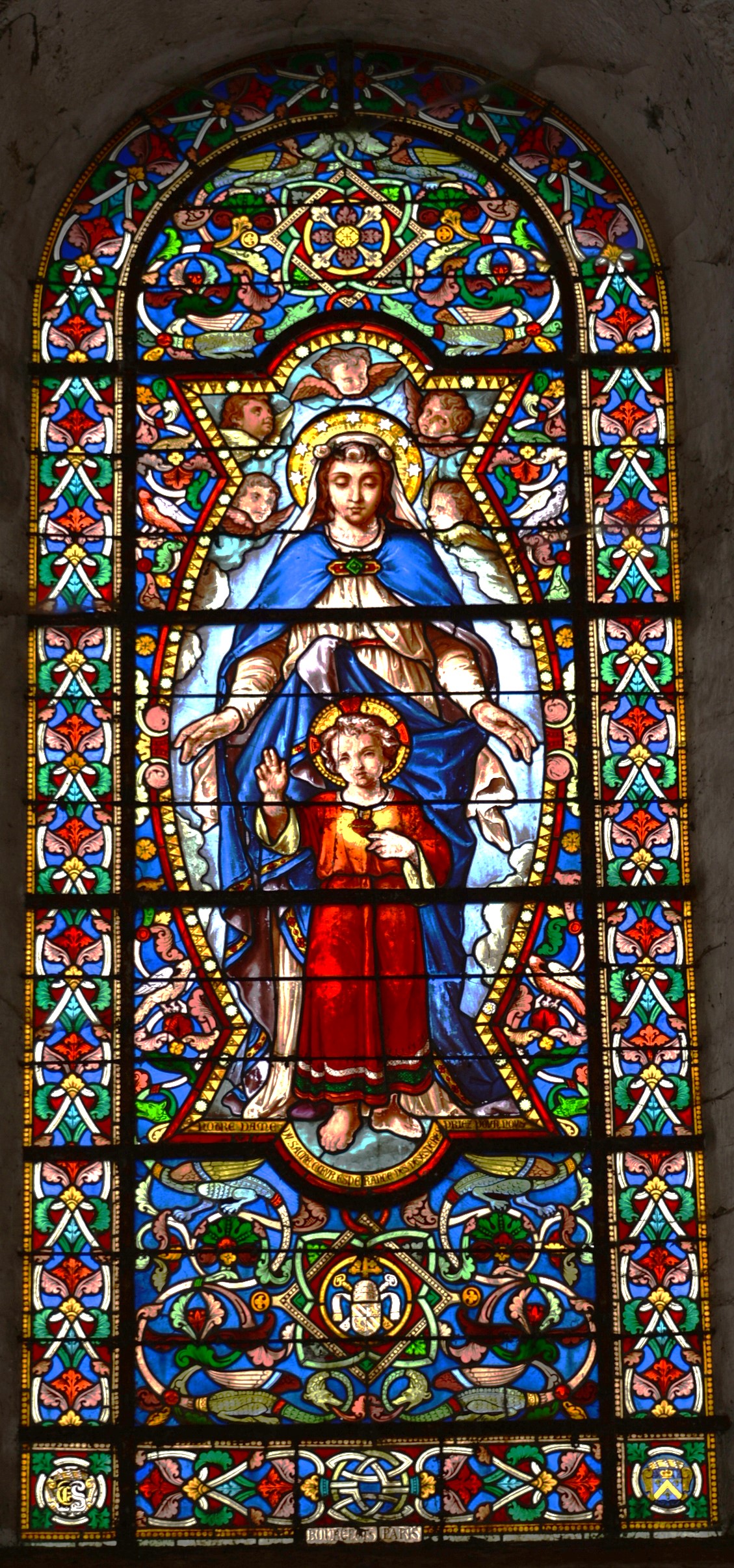 Notre-Dame du Sacré-CœurÉglise de Jouy-le-Châtel - Repère 19Don de Édouard de SilvestreOn remarquera les armes de la famille en bas à droite et les initiales S (Silvestre) entrelacé d'un E (Édouard et Emma) et d'un F (Franz et Fanny) en bas à gauche.Marie-Fanny, Adélaïde-Emma et Franz sont les trois enfants d'Édouard.Vitrail dédié à Marie Fanny.